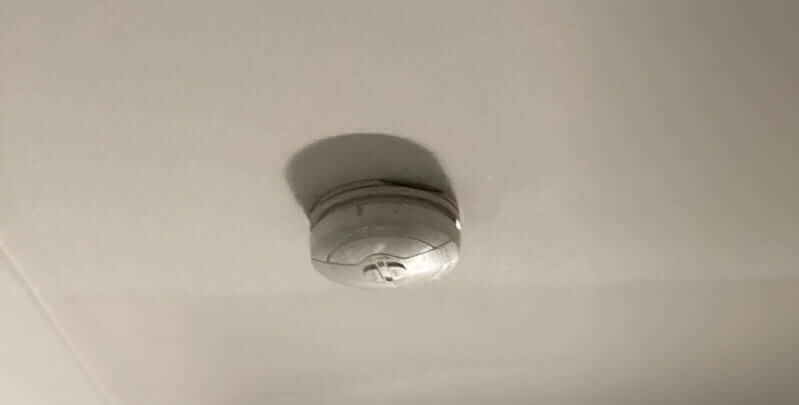 smoke alarm fitted to ceiling of a home